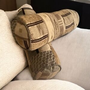 Rolled Pillows Earth-toned colors set of (2) 21” long great for back pain.